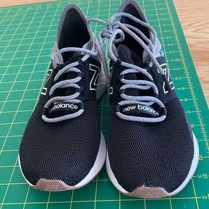 New balance 7.5 slip in does in black and gray.  Rarely worn